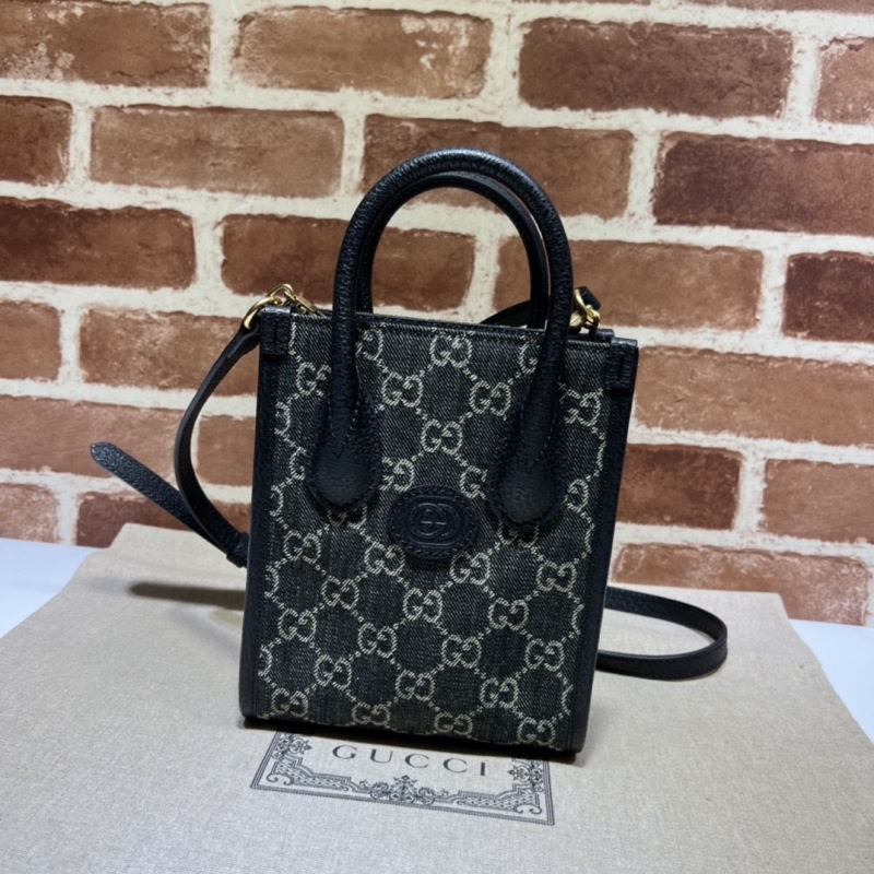G*u*i top handle bags